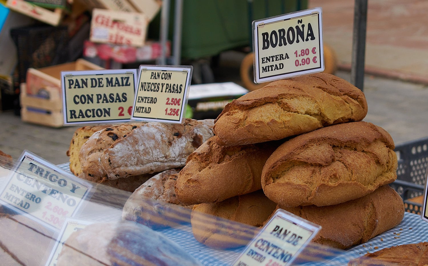 An assortment of breads for sale in a street market in Pola de Lena, Asturias